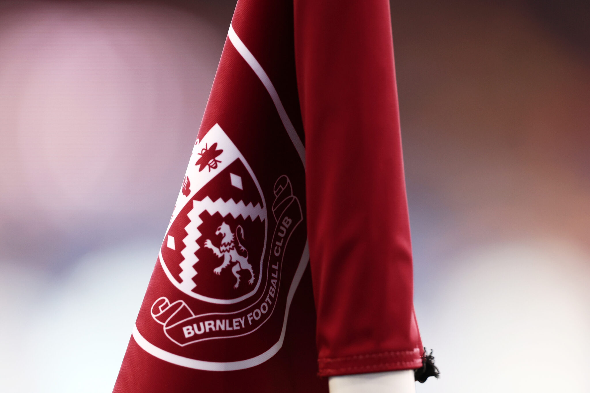 Burnley - A detailed view of the corner flag prior to the Premier League match between Burnley FC and Fulham FC at Turf Moor on February 03, 2024 in Burnley, England.