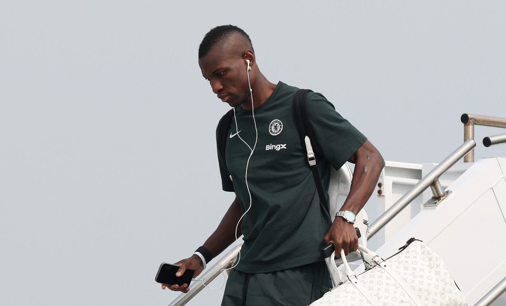 Chelsea striker Nicolas Jackson disembarks a flight as they arrive to Philadelphia International Airport for FIFA Club World Cup 2025 on June 13, 2025 in Philadelphia, Pennsylvania.
