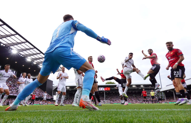 Fulham striker Rodrigo Muniz scores a own goal after he deflects a shot from Leny Yoro of Manchester United, past Bernd Leno of Fulham during the Premier League match between Fulham and Manchester United at Craven Cottage on August 24, 2025 in London, England.