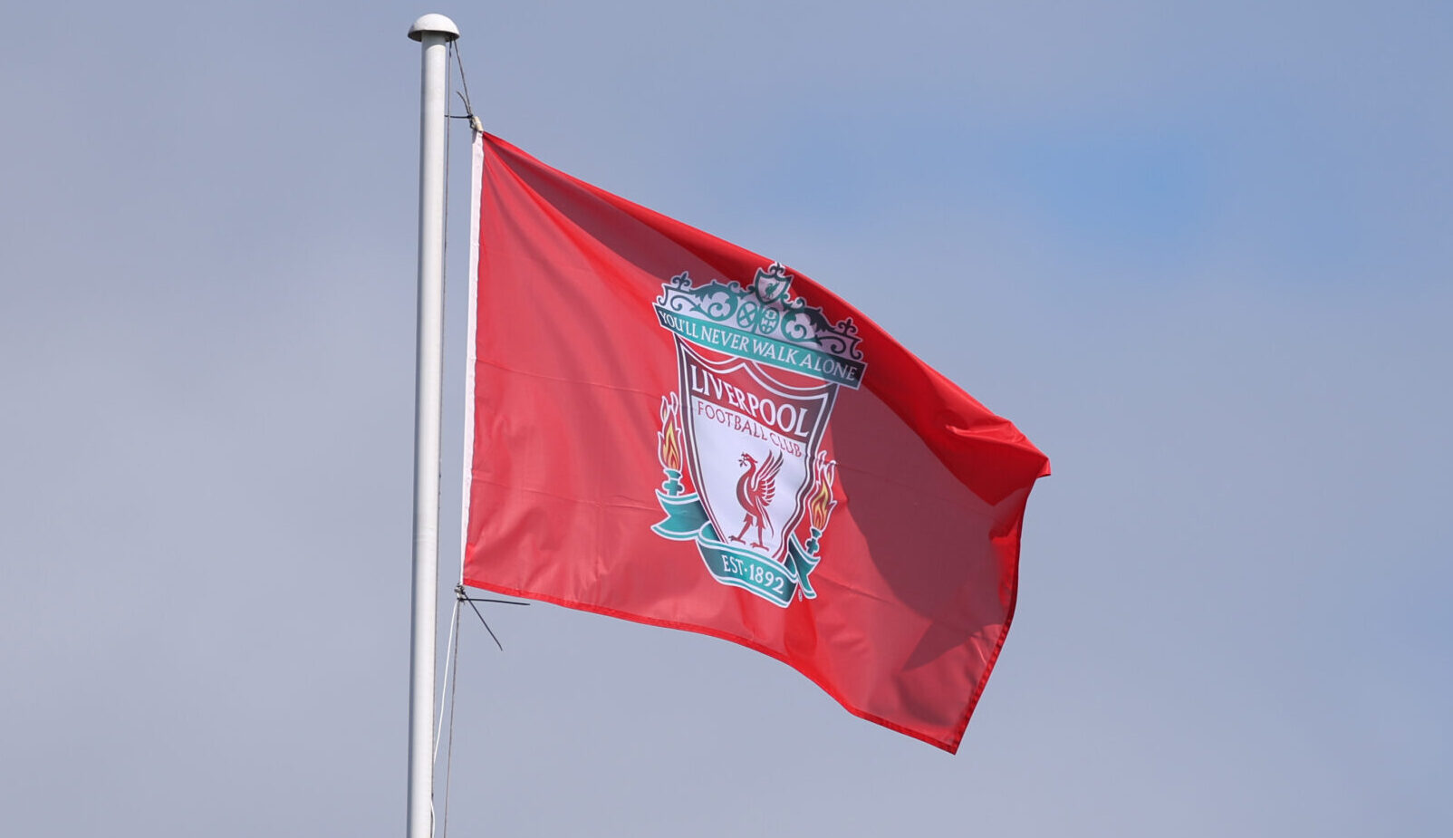 The Liverpool FC flag is seen flying prior to the Barclays Women's Super League match between Liverpool FC and Tottenham Hotspur FC on April 27, 2025 in Liverpool, England.