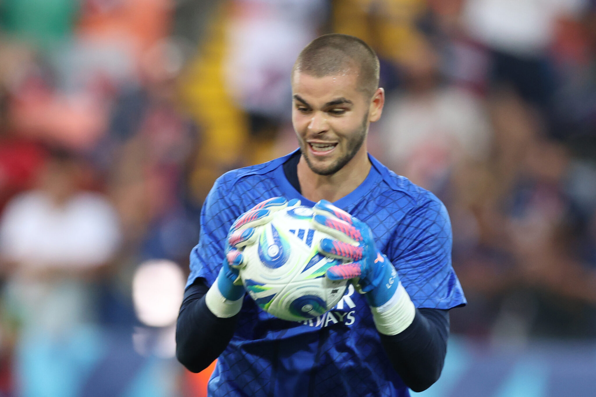 Lucas Chevalier of Paris Saint-Germain in action during warm up prior to the UEFA Super Cup 2025 match between Paris Saint-Germain and Tottenham Hotspur at Friuli Stadium on August 13, 2025 in Udine, Italy.