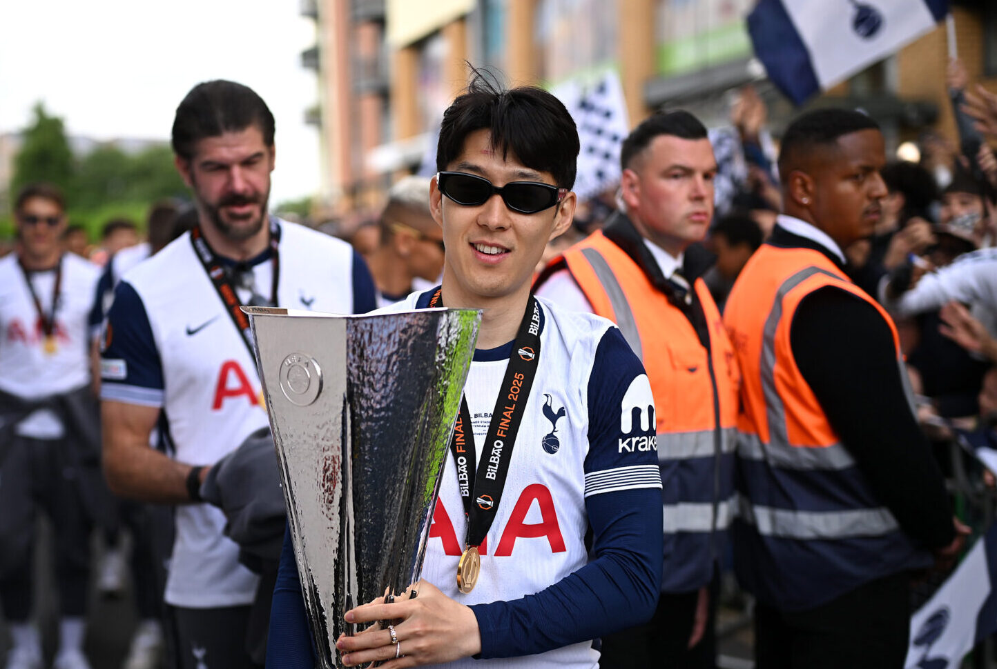 Son Heung-min of Spurs holds the UEFA Europa League trophy during the Tottenham Hotspur UEFA Europa League trophy parade on May 23, 2025 in London, England. Spurs defeated Manchester United in the final in Bilbao on May 21 to win their first major trophy in 17 years.