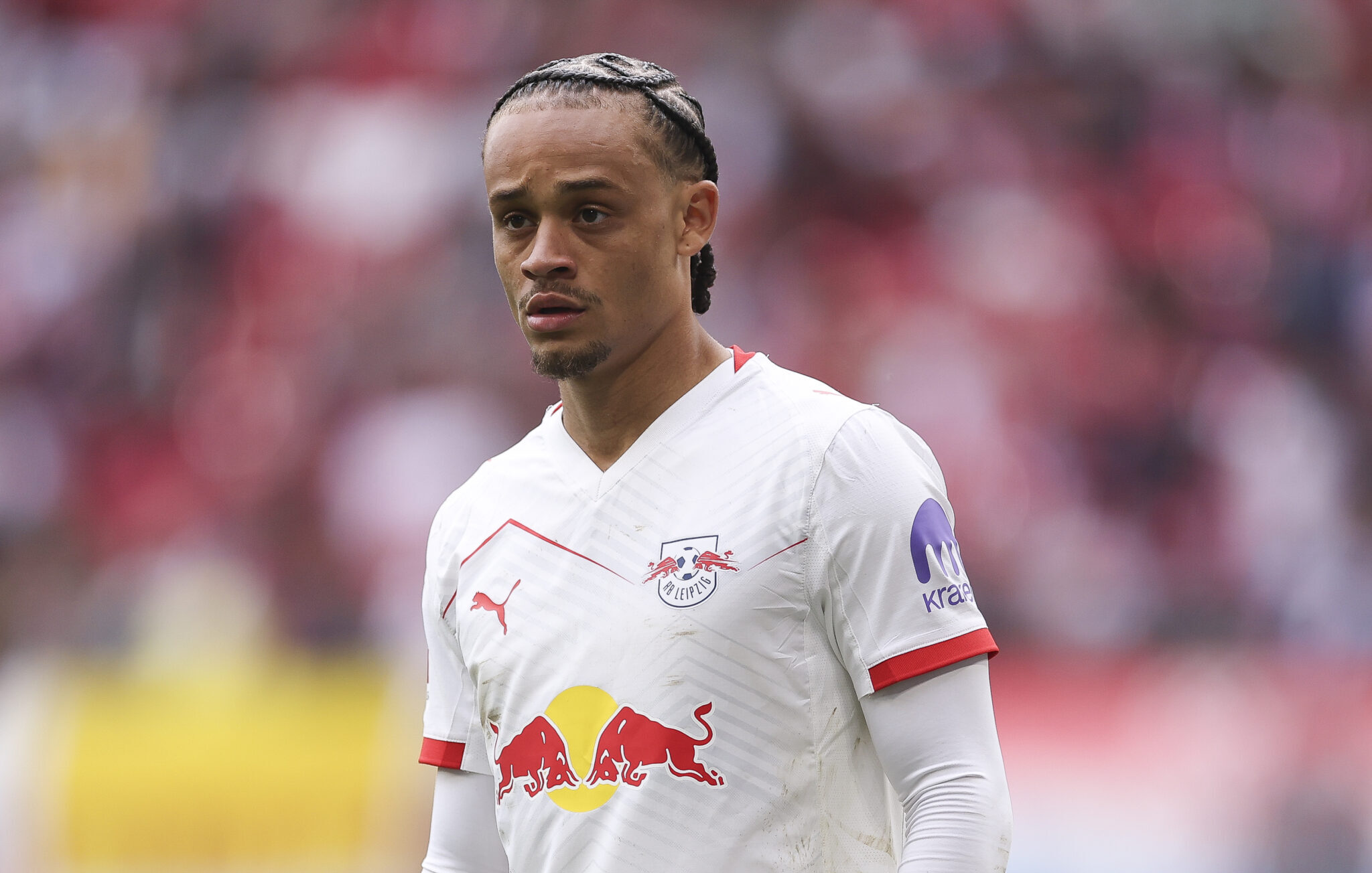 Xavi Simons of RB Leipzig looks on during the Bundesliga match between RB Leipzig and VfB Stuttgart at Red Bull Arena on May 17, 2025 in Leipzig, Germany.