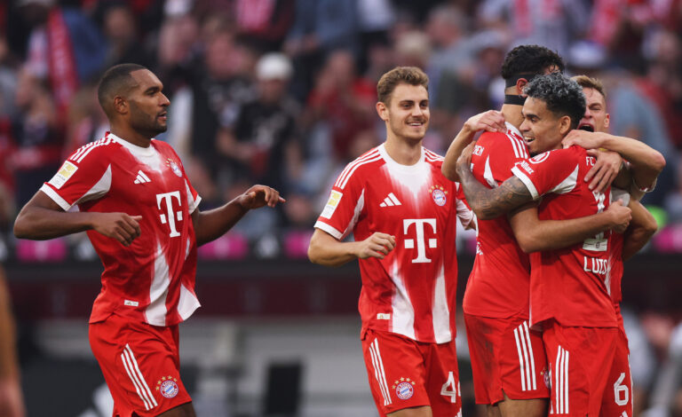 Bayern Munich players celebrate a goal.