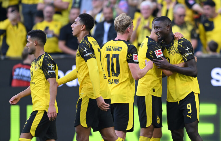 Borussia Dortmund players celebrate a goal.