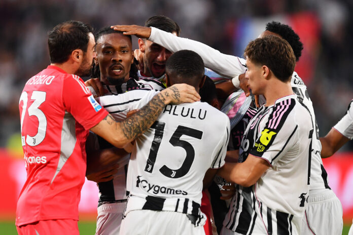 Juventus players celebrate a goal.