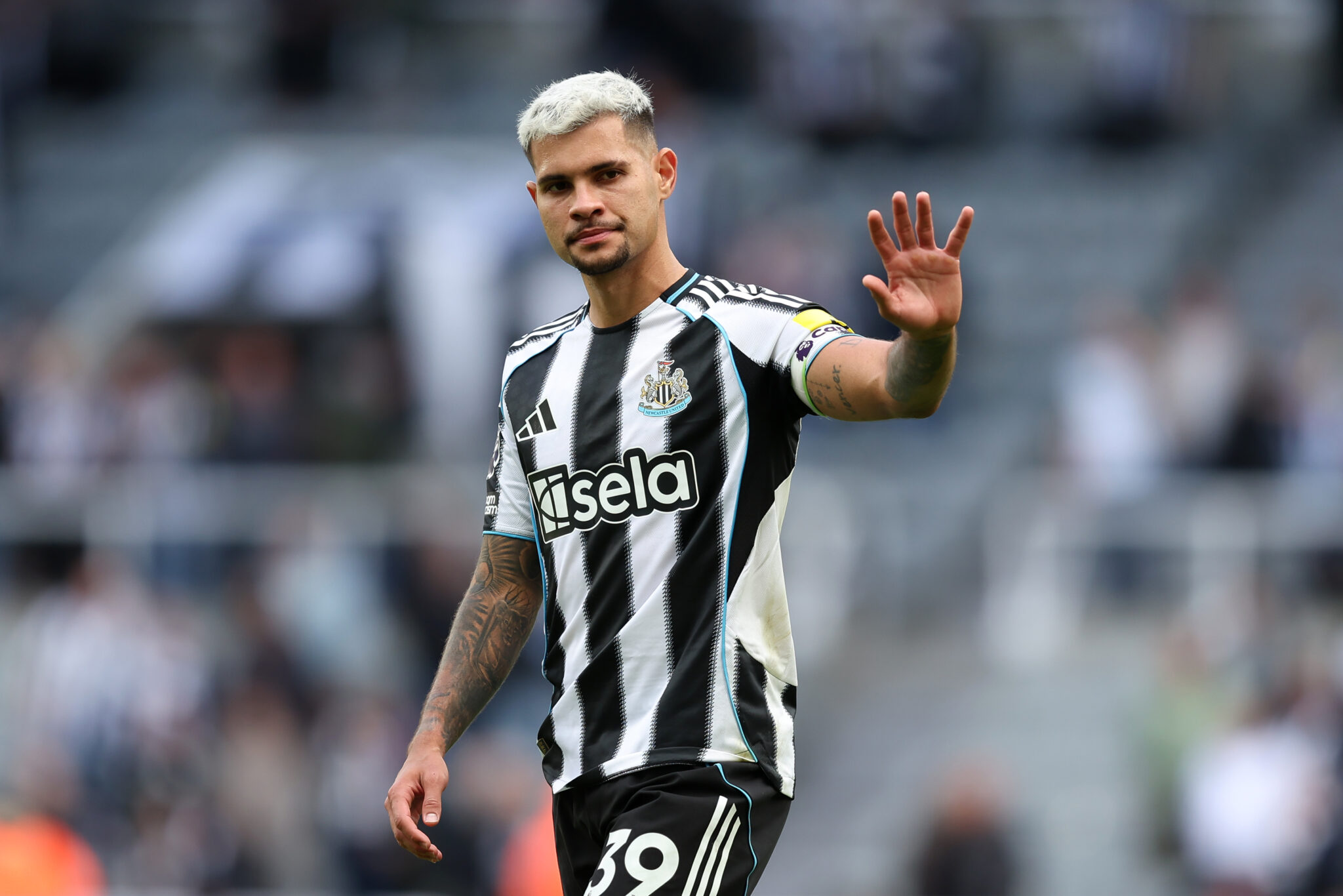 Bruno Guimaraes of Newcastle United waves to the fans during the Premier League match between Newcastle United and Wolverhampton Wanderers at St James' Park on September 13, 2025 in Newcastle upon Tyne, England.