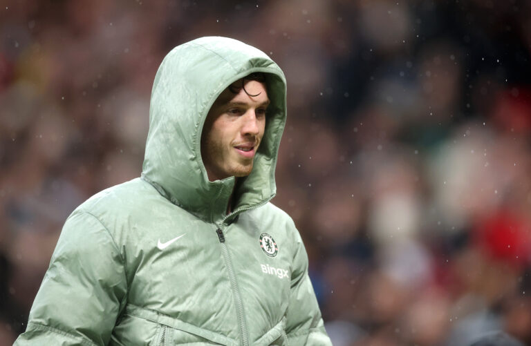 Chelsea player Cole Palmer is seen with his coat on after being substituted during the Premier League match between Manchester United and Chelsea at Old Trafford on September 20, 2025 in Manchester, England.