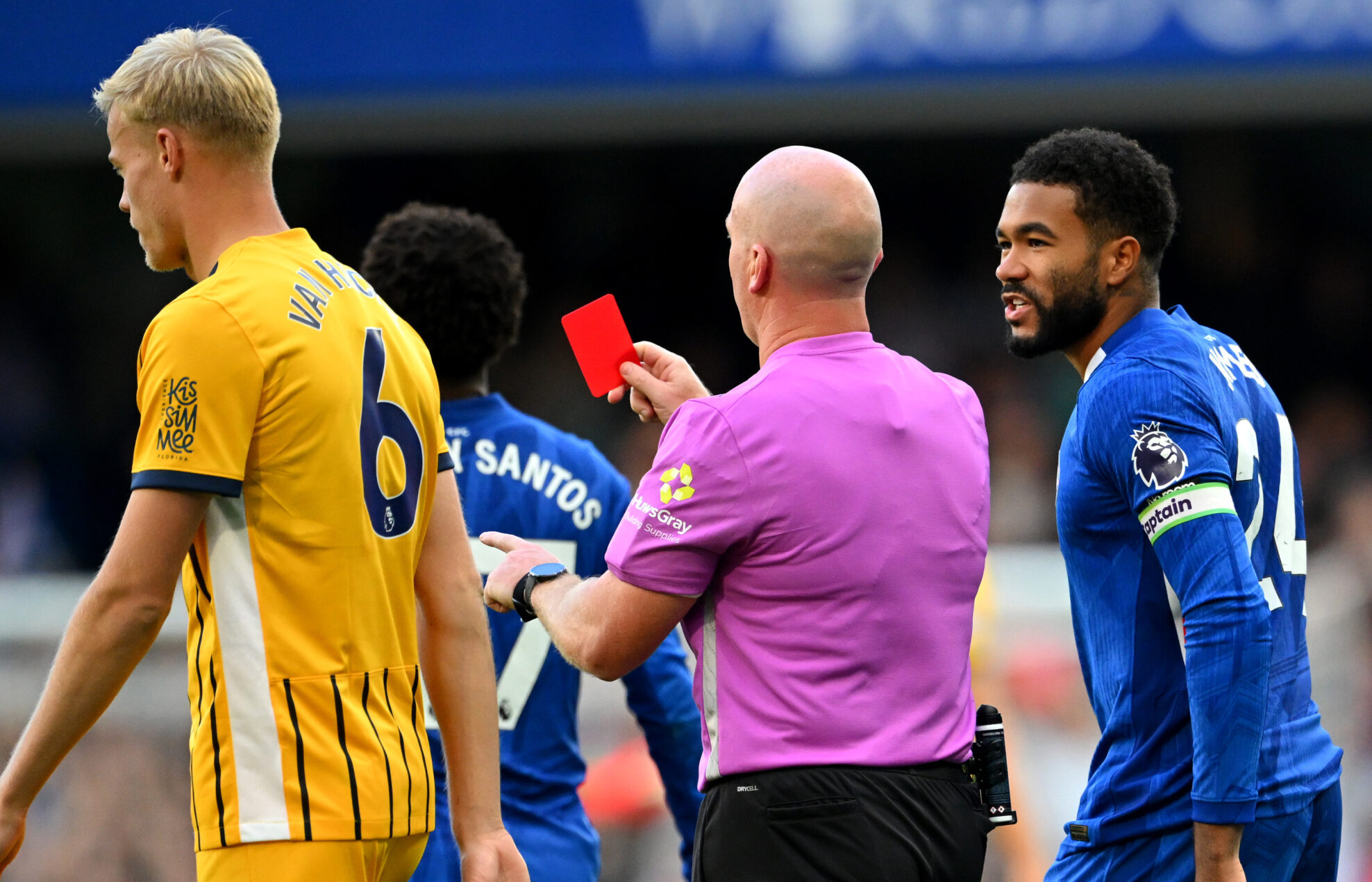 Chelsea player Reece James reacts to referee Simon Hooper showing a red card to Trevoh Chalobah of Chelsea (not pictured) during the Premier League match between Chelsea and Brighton & Hove Albion at Stamford Bridge on September 27, 2025 in London, England.