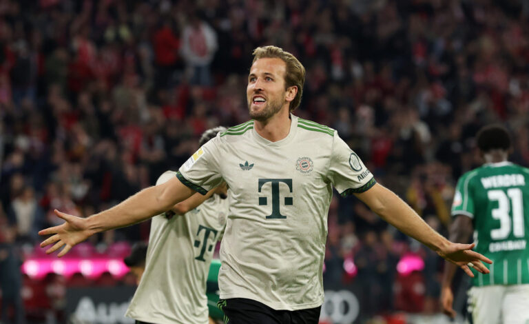 Harry Kane of Bayern Munich celebrates after scoring his team's third goal to reach a record club 100 goals during the Bundesliga match between FC Bayern München and SV Werder Bremen at Allianz Arena on September 26, 2025 in Munich, Germany.