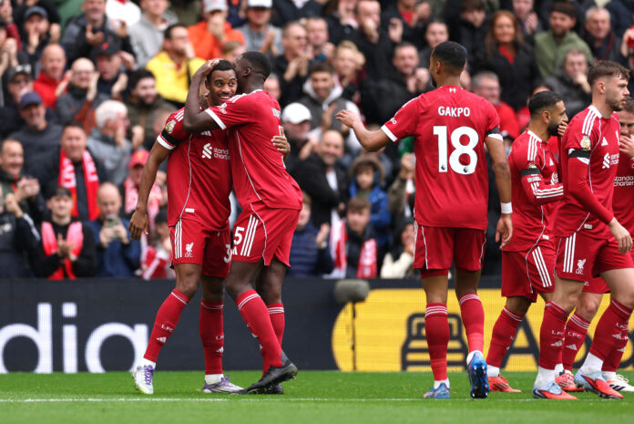 Liverpool player Ryan Gravenberch of Liverpool celebrates scoring his team's first goal with teammate Ibrahima Konate during the Premier League match between Liverpool and Everton at Anfield on September 20, 2025 in Liverpool, England.