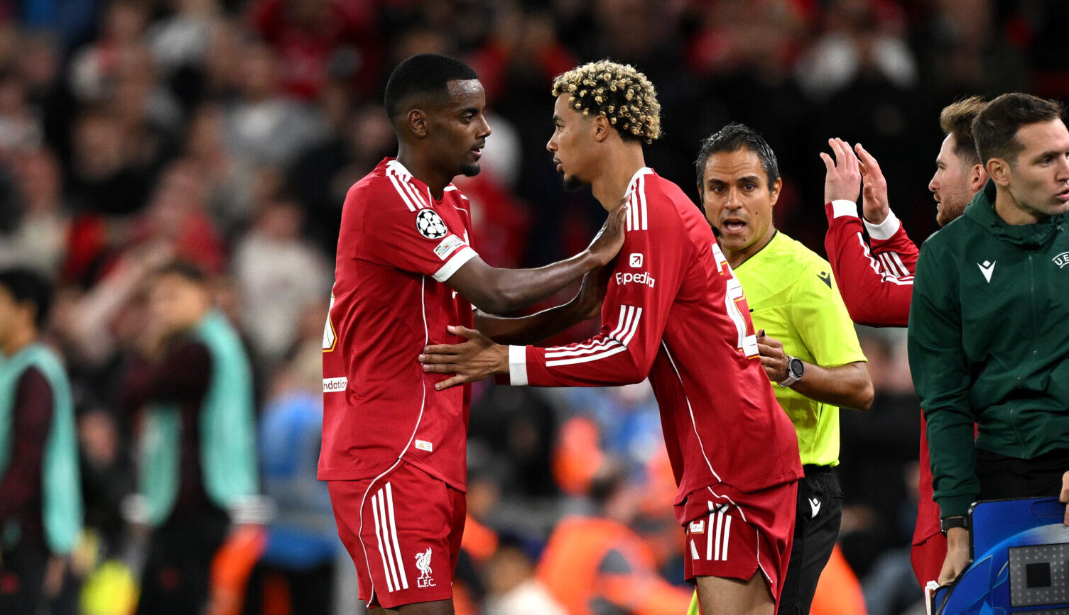 Liverpool player Hugo Ekitike comes on as a substitute to replace Alexander Isak of Liverpool during the UEFA Champions League 2025/26 League Phase MD1 match between Liverpool FC and Atletico de Madrid at Anfield on September 17, 2025 in Liverpool, England.