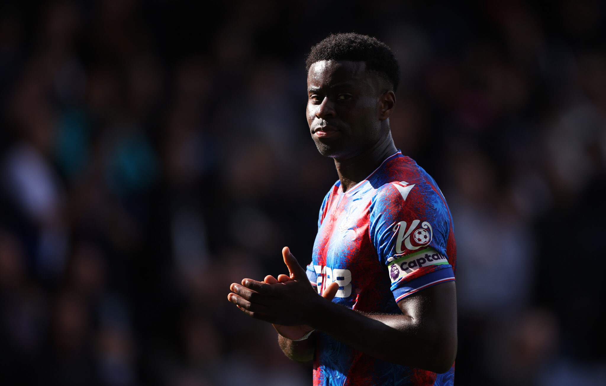 Marc Guehi of Crystal Palace applauds the fans following the team's defeat during the Premier League match between Crystal Palace FC and Liverpool FC at Selhurst Park on October 05, 2024 in London, England.