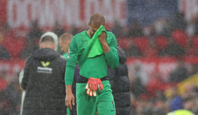 Premier League - Robert Sanchez of Chelsea looks dejected after being shown a red card for a foul on Bryan Mbeumo of Manchester United (not pictured) during the Premier League match between Manchester United and Chelsea at Old Trafford on September 20, 2025 in Manchester, England.