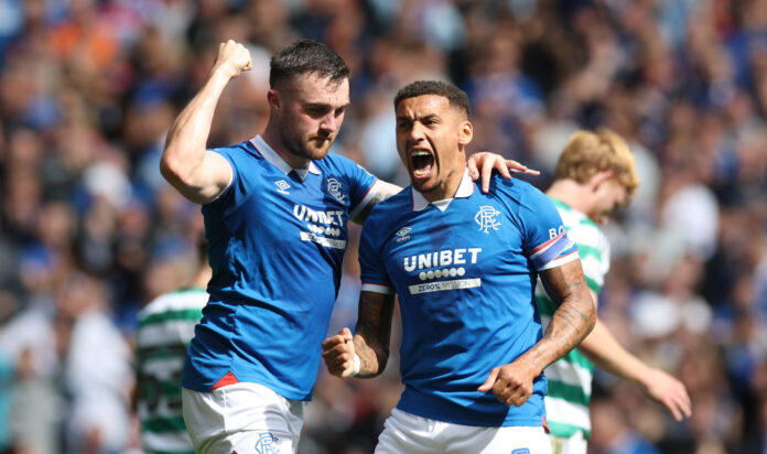 Rangers player John Souttar celebrates scoring his team's goal with teammate James Tavernier, which is later disallowed during the Premier League match between Rangers and Celtic at Ibrox Stadium on August 31, 2025 in Glasgow, Scotland.