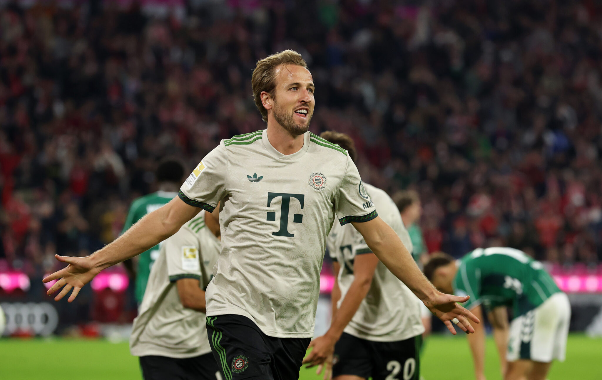Bayern Munich striker Harry Kane celebrates a goal.