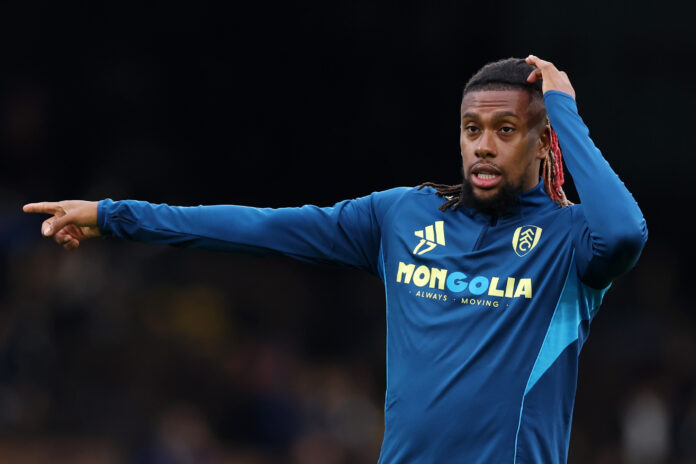 Five African players with 300 Premier League Appearances Alex Iwobi of Fulham gestures as he warms up prior to the Premier League match between Fulham and Arsenal at Craven Cottage on October 18, 2025 in London, England.