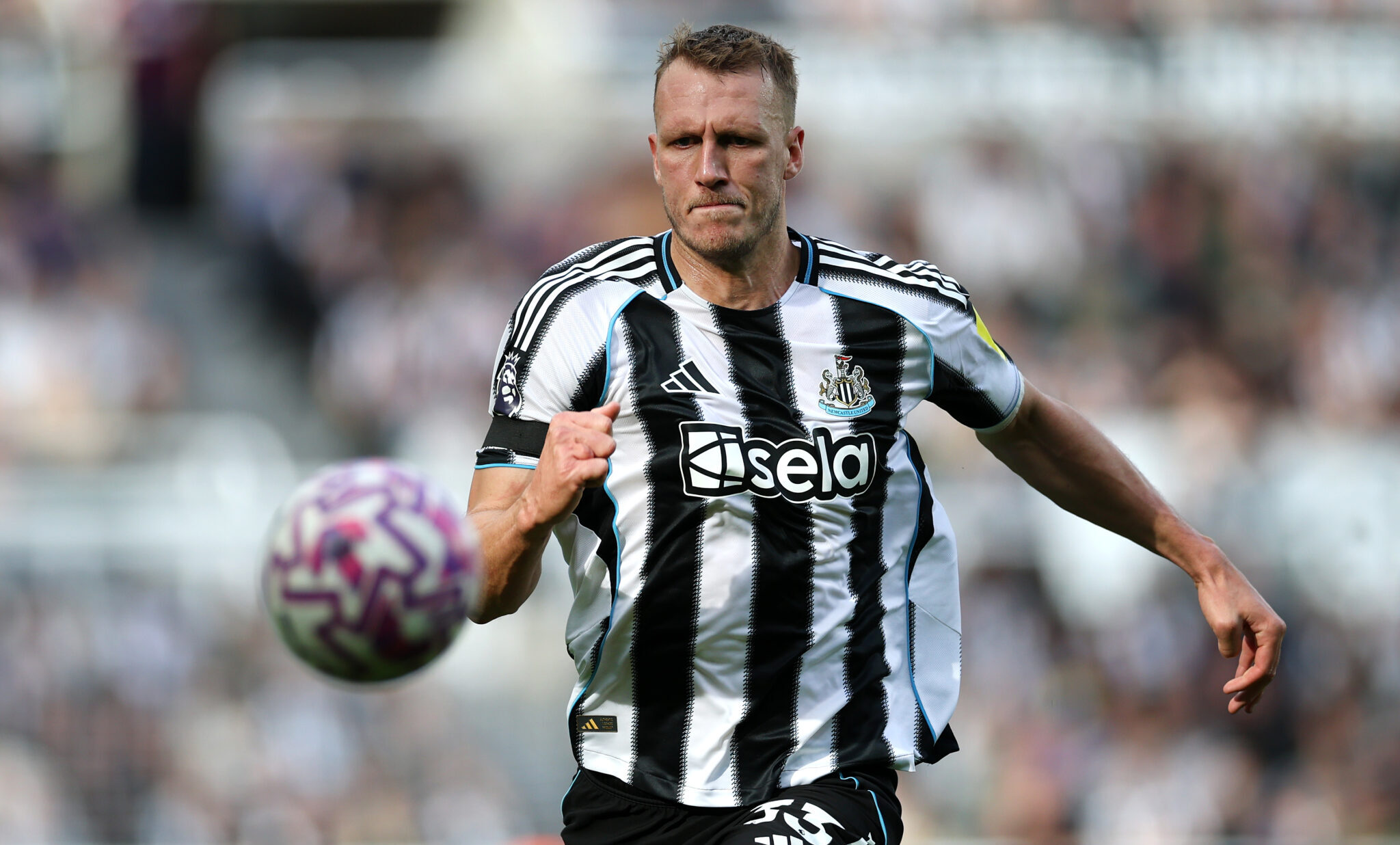 Dan Burn of Newcastle United in action during the Premier League match between Newcastle United and Nottingham Forest at St James' Park on October 05, 2025 in Newcastle upon Tyne, England.