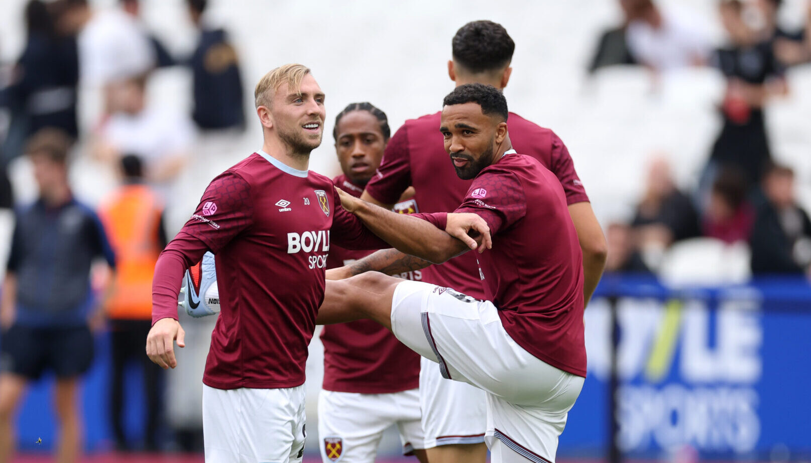 West Ham United players Jarrod Bowen and Callum Wilson warm up together.