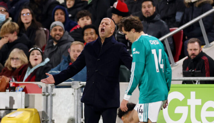 Arne Slot, Manager of Liverpool, reacts on the touchline during the Premier League match between Brentford and Liverpool at Gtech Community Stadium on October 25, 2025 in Brentford, England.