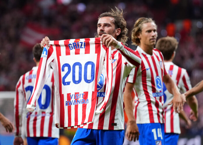 Antoine Griezmann of Atletico de Madrid celebrates scoring his team's third goal, his 200th goal for Atletico de Madrid during the UEFA Champions League 2025/26 League Phase MD2 match between Atletico de Madrid and Eintracht Frankfurt at Estadio Metropolitano on September 30, 2025 in Madrid, Spain.