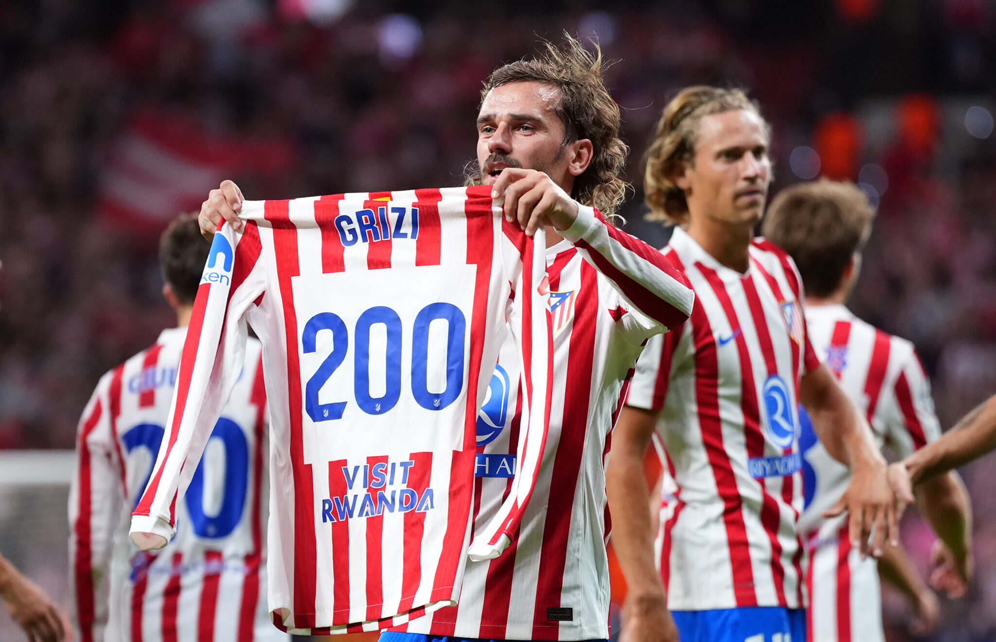 Antoine Griezmann of Atletico de Madrid celebrates scoring his team's third goal, his 200th goal for Atletico de Madrid during the UEFA Champions League 2025/26 League Phase MD2 match between Atletico de Madrid and Eintracht Frankfurt at Estadio Metropolitano on September 30, 2025 in Madrid, Spain.
