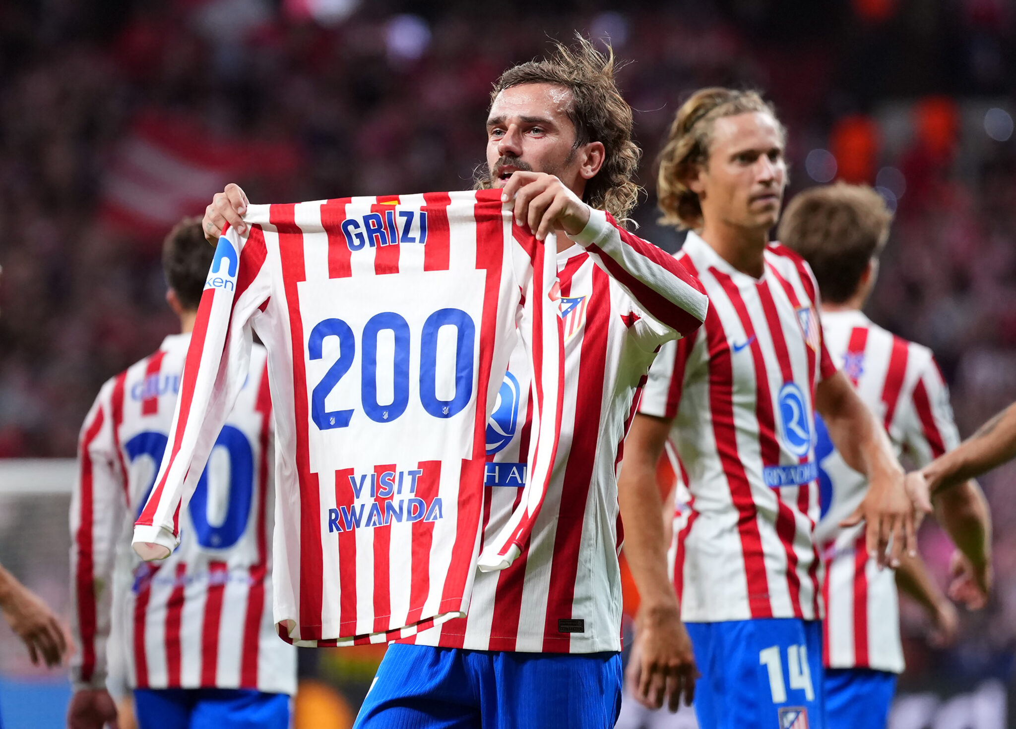 Antoine Griezmann of Atletico de Madrid celebrates scoring his team's third goal, his 200th goal for Atletico de Madrid during the UEFA Champions League 2025/26 League Phase MD2 match between Atletico de Madrid and Eintracht Frankfurt at Estadio Metropolitano on September 30, 2025 in Madrid, Spain.