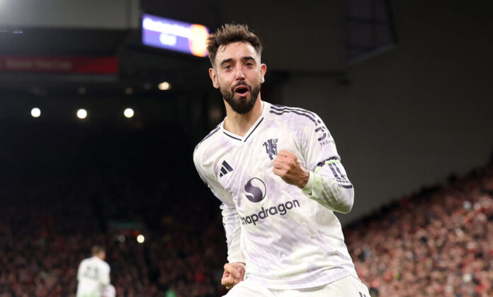Bruno Fernandes of Man Utd celebrates after Harry Maguire (not pictured) scores his team's second goal during the Premier League match between Liverpool and Manchester United at Anfield on October 19, 2025 in Liverpool, England.