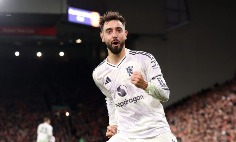 Bruno Fernandes of Man Utd celebrates after Harry Maguire (not pictured) scores his team's second goal during the Premier League match between Liverpool and Manchester United at Anfield on October 19, 2025 in Liverpool, England.