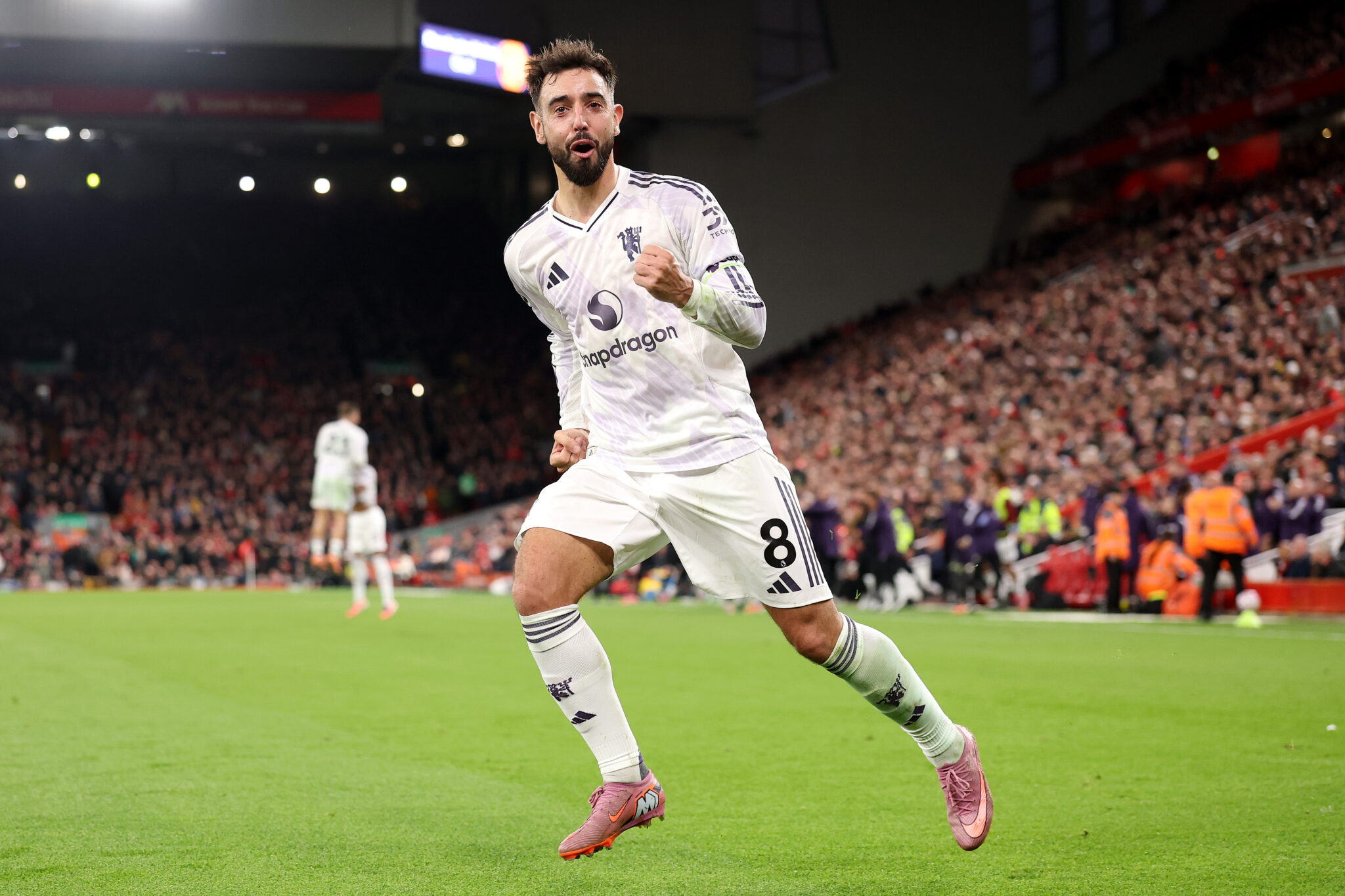 Bruno Fernandes of Man Utd celebrates after Harry Maguire (not pictured) scores his team's second goal during the Premier League match between Liverpool and Manchester United at Anfield on October 19, 2025 in Liverpool, England.