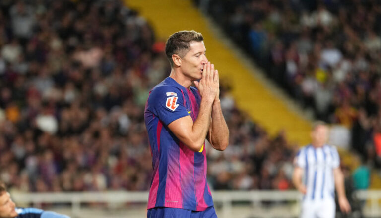 Robert Lewandowski of FC Barcelona reacts after a missed chance during the LaLiga EA Sports match between FC Barcelona and Real Sociedad at Estadi Olimpic Lluis Companys on September 28, 2025 in Barcelona, Spain.