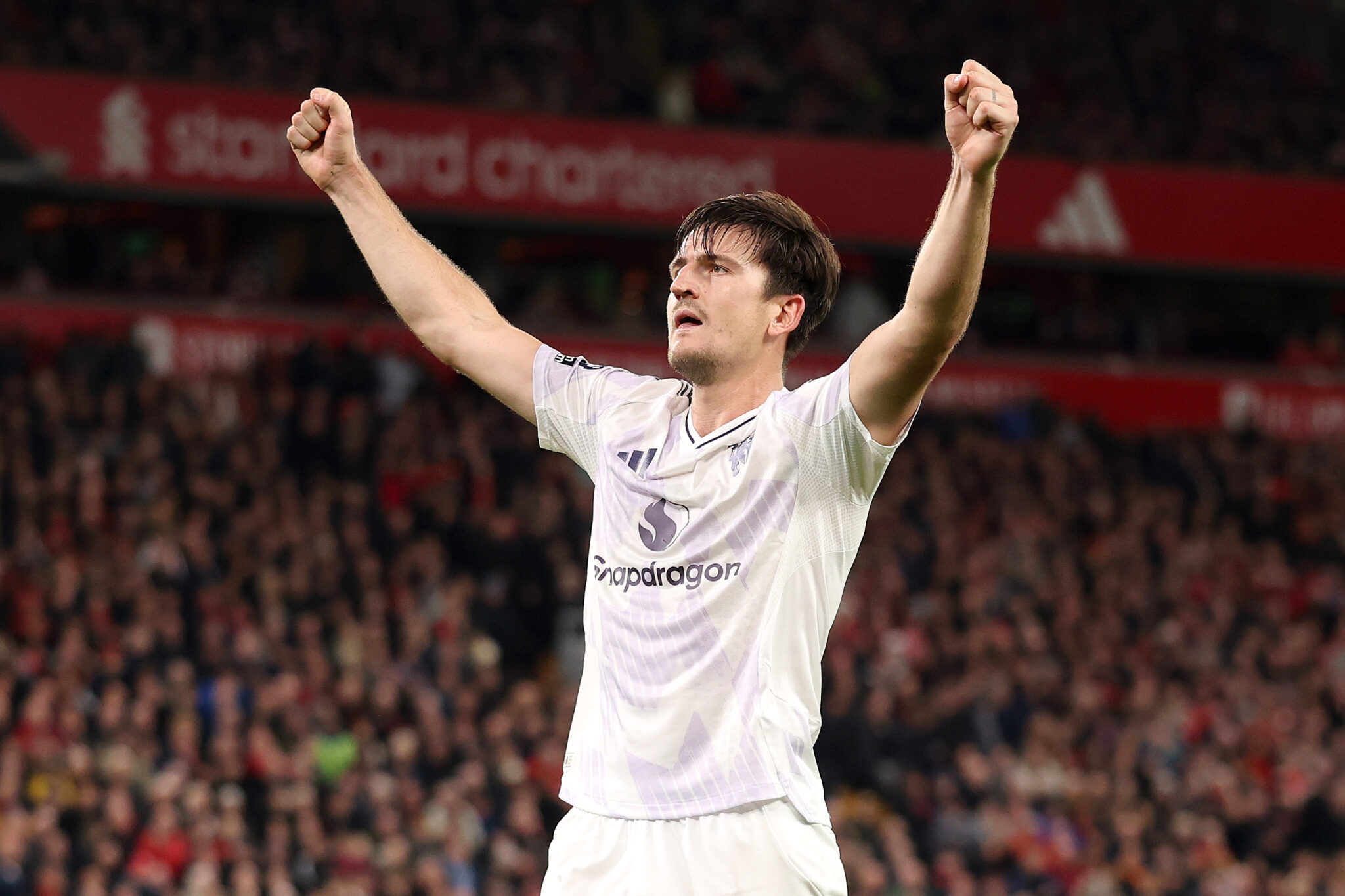 Harry Maguire of Man Utd celebrates scoring his team's second goal during the Premier League match between Liverpool and Manchester United at Anfield on October 19, 2025 in Liverpool, England.