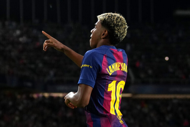 Lamine Yamal of FC Barcelona celebrates after scoring his team's third goal from the penalty spot during the UEFA Champions League 2025/26 League Phase MD3 match between FC Barcelona and Olympiacos FC at Estadi Olimpic Lluis Companys on October 21, 2025 in Barcelona, Spain.