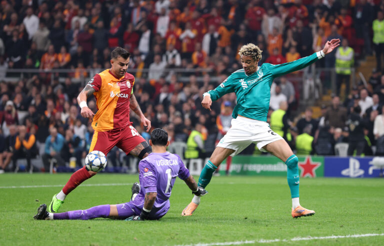Liverpool forward Hugo Ekitike is challenged by Ugurcan Cakir of Galatasaray A.S. during the UEFA Champions League 2025/26 League Phase MD2 match between Galatasaray A.S. and Liverpool FC at Ali Sami Yen Spor Kompleksi on September 30, 2025 in Istanbul, Turkey.
