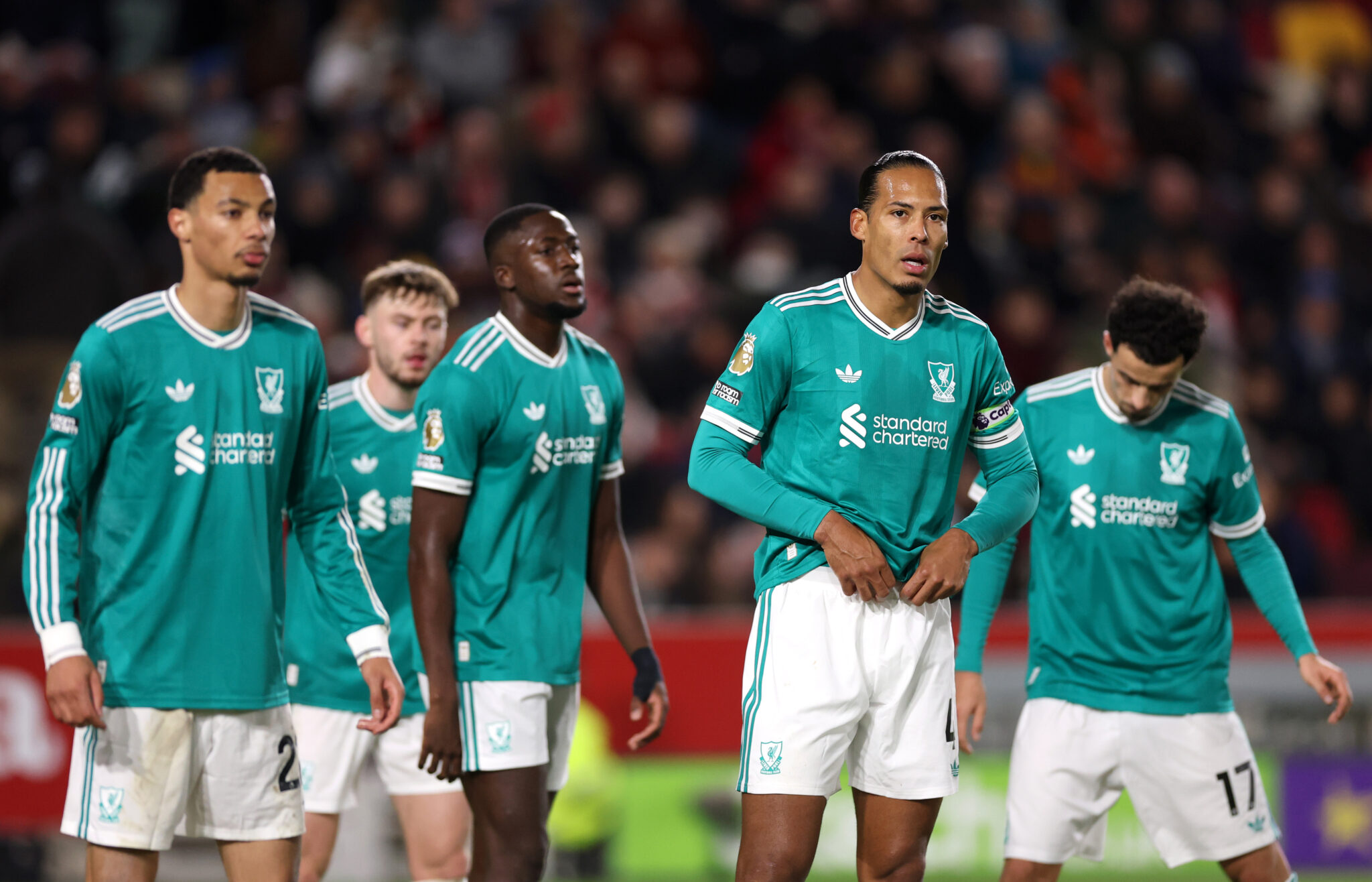 Brentford v Liverpool - Premier League Liverpool captain Virgil van Dijk looks on alongside teammates during the Premier League match between Brentford and Liverpool at Gtech Community Stadium on October 25, 2025 in Brentford, England.