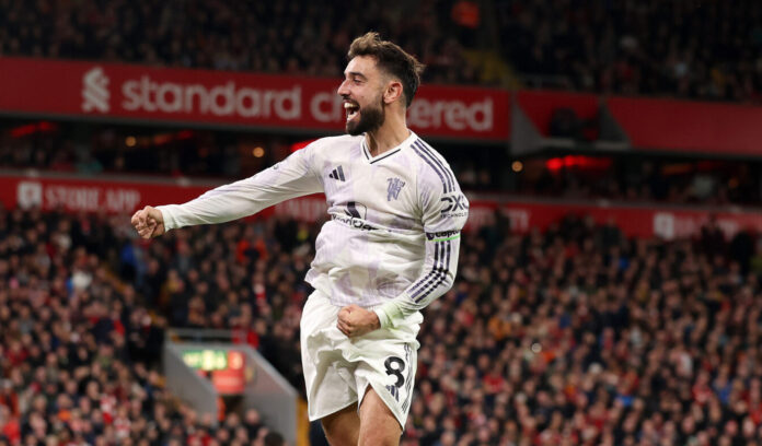 Bruno Fernandes of Man Utd celebrates after Harry Maguire of Manchester United (not pictured) scores his team's second goal during the Premier League match between Liverpool and Manchester United at Anfield on October 19, 2025 in Liverpool, England.