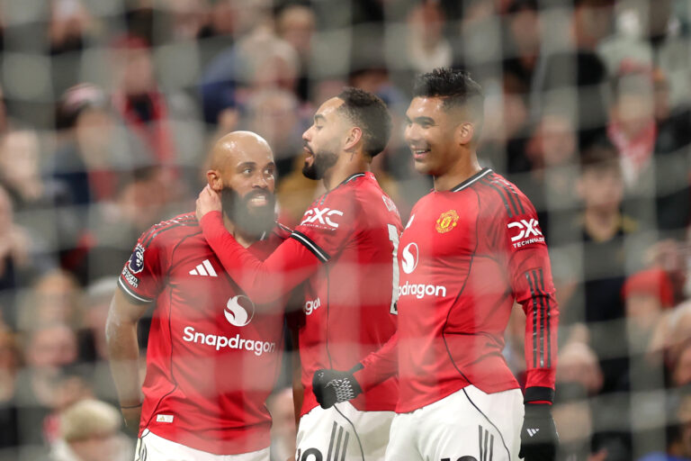 Premier League - Bryan Mbeumo of Man Utd celebrates scoring his team's third goal with teammates Matheus Cunha and Casemiro during the Premier League match between Manchester United and Brighton & Hove Albion at Old Trafford on October 25, 2025 in Manchester, England.