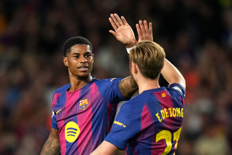 Champions League - Marcus Rashford of FC Barcelona celebrates with teammate Frenkie de Jong after scoring his team's sixth goal during the UEFA Champions League 2025/26 League Phase MD3 match between FC Barcelona and Olympiacos FC at Estadi Olimpic Lluis Companys on October 21, 2025 in Barcelona, Spain.