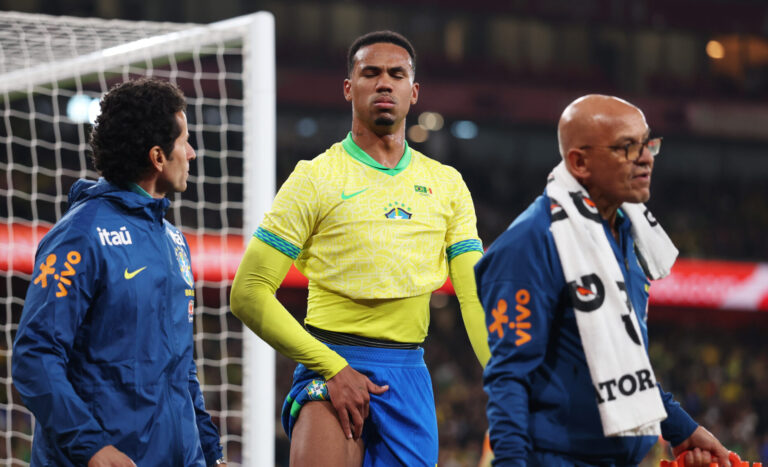 Arsenal defender Gabriel Magalhaes nurses an injury while playing for Brazil.