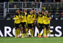 Borussia Dortmund vs Werder Bremen – Predicted lineup and team news Borussia Dortmund players celebrate a goal.