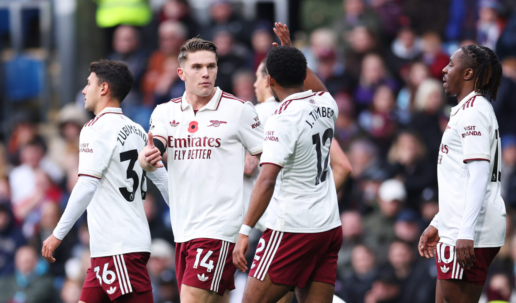 Viktor Gyokeres of Arsenal celebrates scoring his team's first goal with teammate Jurrien Timber during the Premier League match between Burnley and Arsenal at Turf Moor on November 01, 2025 in Burnley, England.
