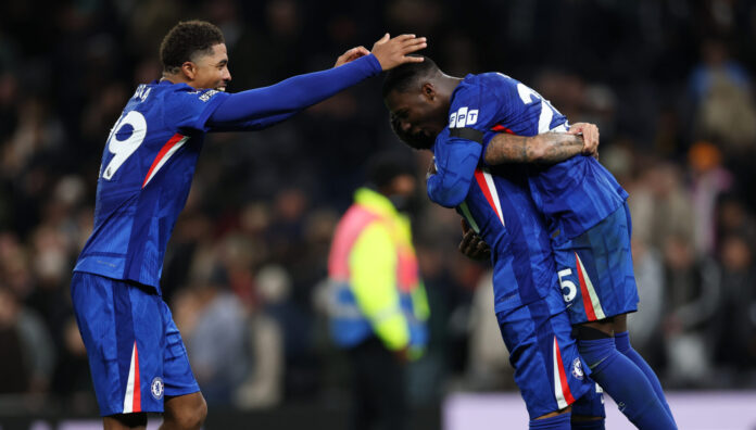 Chelsea players Wesley Fofana, Malo Gusto and Moises Caicedo celebrate following the team's victory during the Premier League match between Tottenham Hotspur and Chelsea at Tottenham Hotspur Stadium on November 01, 2025 in London, England.