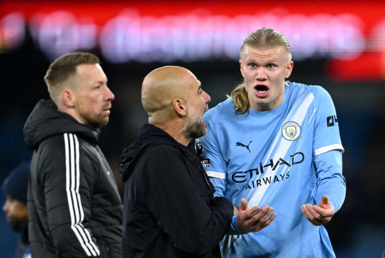 Erling Haaland of Man City speaks with Pep Guardiola, Manager of Manchester City, after the Premier League match between Manchester City and Leeds United at Etihad Stadium on November 29, 2025 in Manchester, England.