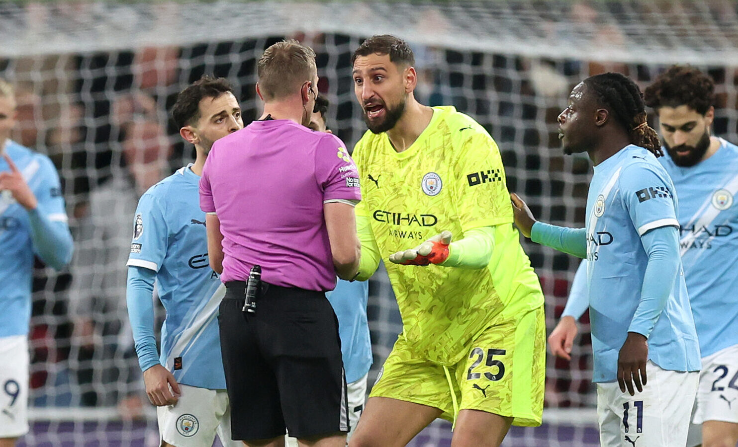 Man City goalkeeper Gianluigi Donnarumma remonstrates with the Referee, Samuel Barrott, after Harvey Barnes (not pictured) of Newcastle United scores his team's second goal during the Premier League match between Newcastle United and Manchester City at St James' Park on November 22, 2025 in Newcastle upon Tyne, England.