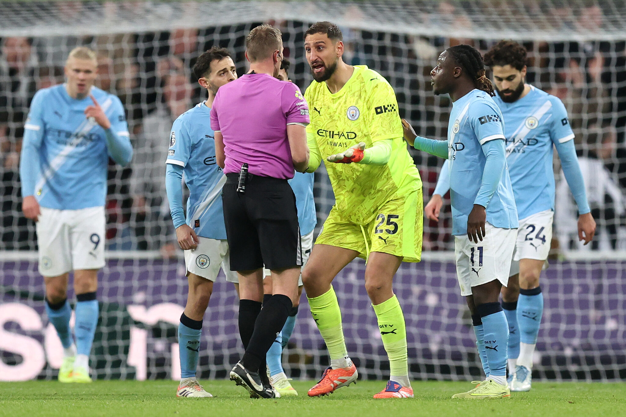 Man City goalkeeper Gianluigi Donnarumma remonstrates with the Referee, Samuel Barrott, after Harvey Barnes (not pictured) of Newcastle United scores his team's second goal during the Premier League match between Newcastle United and Manchester City at St James' Park on November 22, 2025 in Newcastle upon Tyne, England.