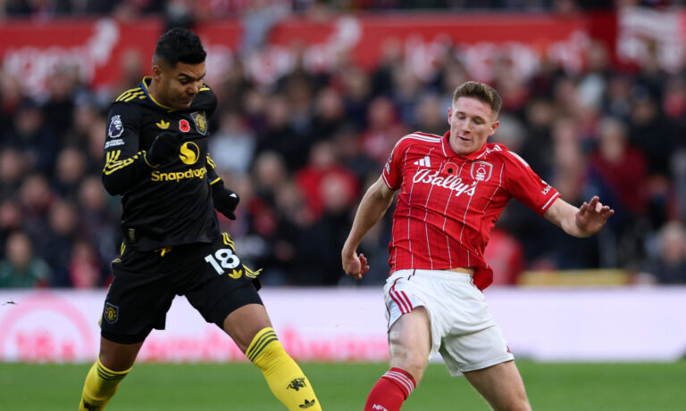 Elliot Anderson of Nottingham Forest battles for possession with Casemiro of Man Utd during the Premier League match between Nottingham Forest and Manchester United at City Ground on November 01, 2025 in Nottingham, England.