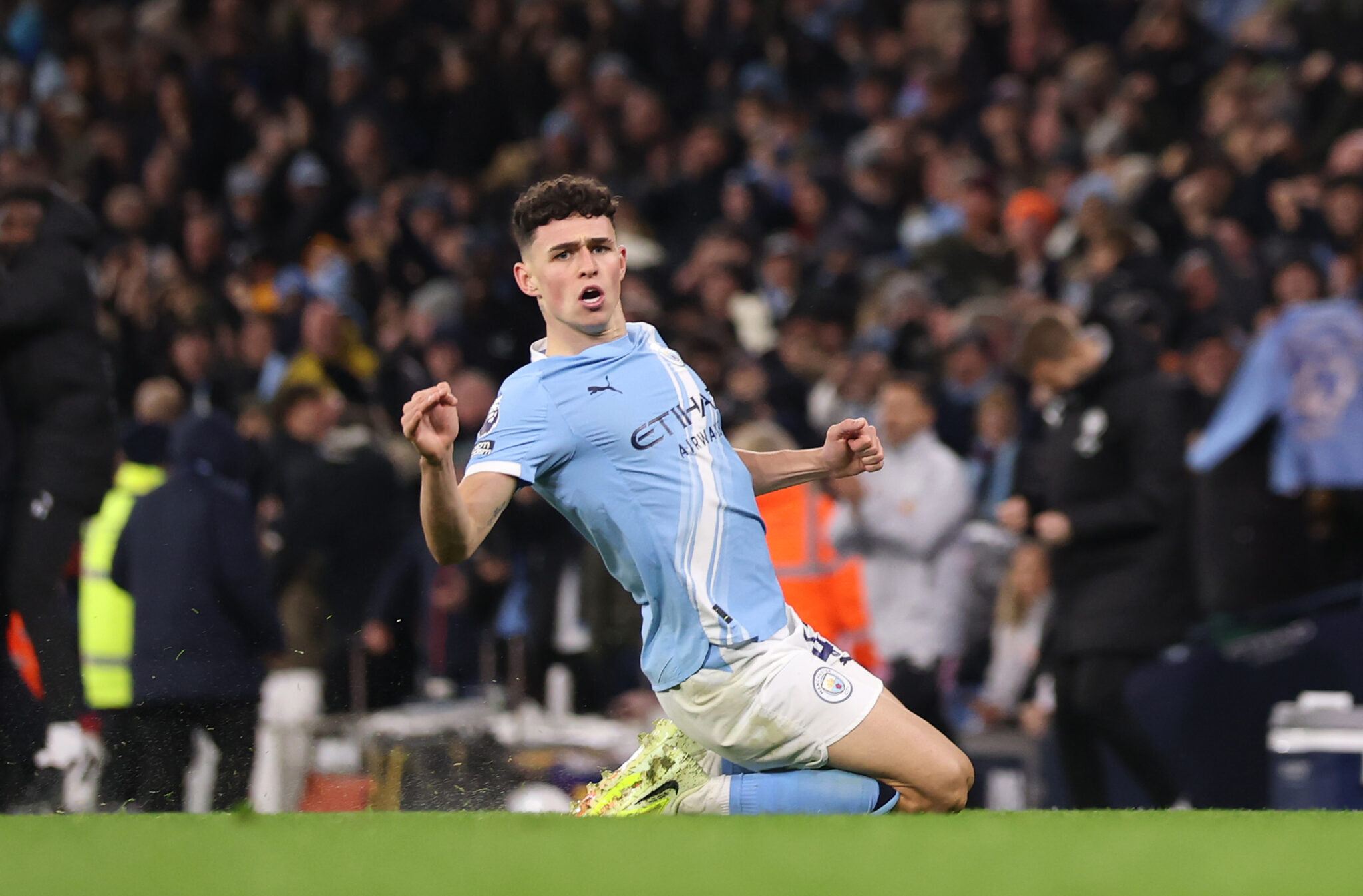 Phil Foden of Man City celebrates scoring his team's third goal during the Premier League match between Manchester City and Leeds United at Etihad Stadium on November 29, 2025 in Manchester, England.