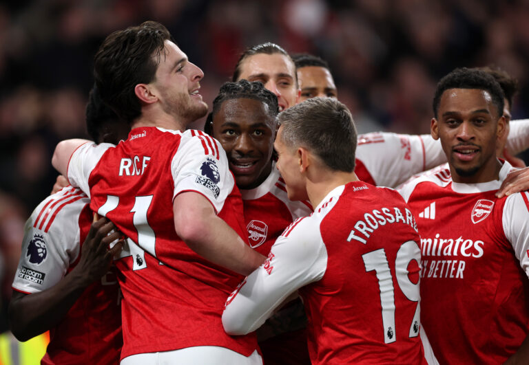 Eberechi Eze of Arsenal celebrates scoring his team's second goal with teammates during the Premier League match between Arsenal and Tottenham Hotspur at Emirates Stadium on November 23, 2025 in London, England.