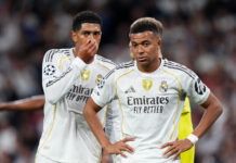 The youngest players to reach 50 Champions League appearances Jude Bellingham and Kylian Mbappe of Real Madrid look on during the UEFA Champions League 2025/26 League Phase MD3 match between Real Madrid C.F. and Juventus at Estadio Santiago Bernabeu on October 22, 2025 in Madrid, Spain.