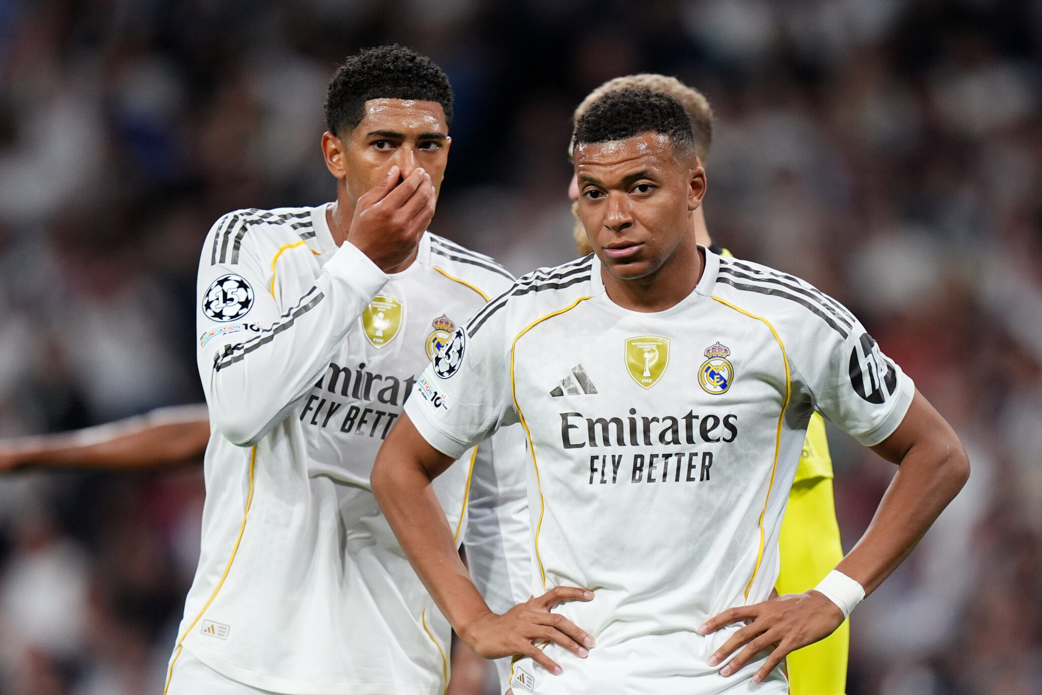 Jude Bellingham and Kylian Mbappe of Real Madrid look on during the UEFA Champions League 2025/26 League Phase MD3 match between Real Madrid C.F. and Juventus at Estadio Santiago Bernabeu on October 22, 2025 in Madrid, Spain.